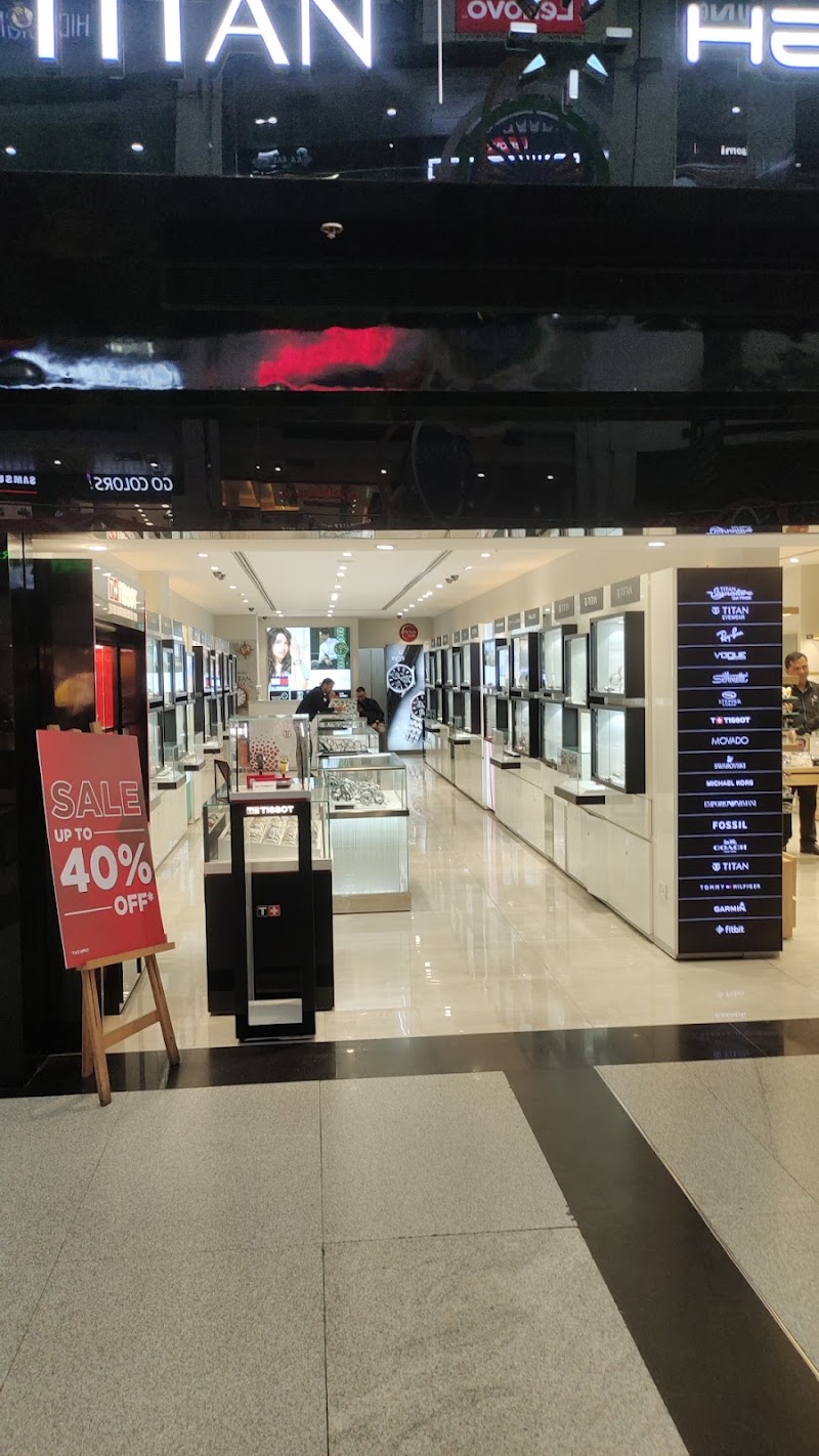 Titan World - MGF Metropolitan Mall, Gurugram - Titan World - MGF Metropolitan Mall, Gurugram Shop No Ground Floor, MGF Metropolitan Mall, 67-68, Mehrauli-Gurgaon Rd, near Bata Showroom, DLF Phase 2, Sector 25, Gurugram, Haryana 122009, India