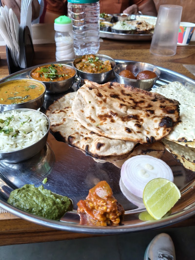 Pind di Haveli (Pure veg.) Punjabi, Rajasthani, Gujarati,Jain food, Chinese, Italian, Multi cuisine, Ac. Restaurant. - Pind di Haveli (Pure veg.) Punjabi, Rajasthani, Gujarati,Jain food, Chinese, Italian, Multi cuisine, Ac. Restaurant. Plot no. 1A, Machla Magra Scheme Patel Circle, near BPCL Petrol Pump, Jawahar Nagar, Khanjipeer, Udaipur, Rajasthan 313001, India