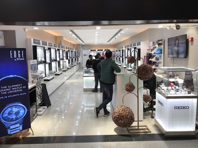 Helios Watch Store - MGF Metropolitan Mall, Gurugram - Helios Watch Store - MGF Metropolitan Mall, Gurugram Shop No, GROUND FLOOR, MGF Metropolitan Mall, 67-68, Mehrauli-Gurgaon Rd, near by Metro Station, DLF Phase 2, Sector 25, Gurugram, Haryana 122002, India