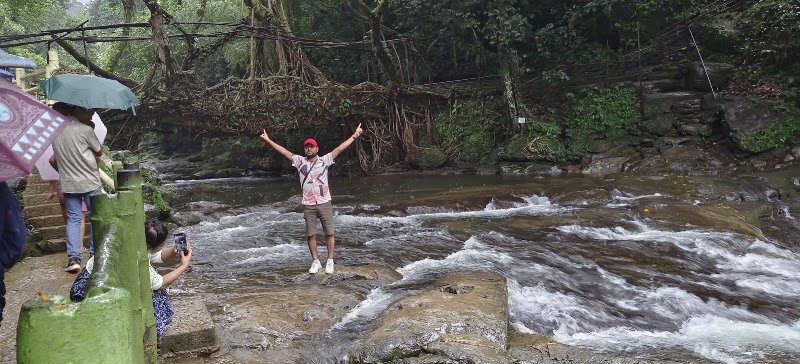Living bridge, Parking lot, Riwai Village, Mawlynnong Road - Living bridge, Parking lot, Riwai Village, Mawlynnong Road 6V5X+3WW, Nongthymmai, Meghalaya 793110, India