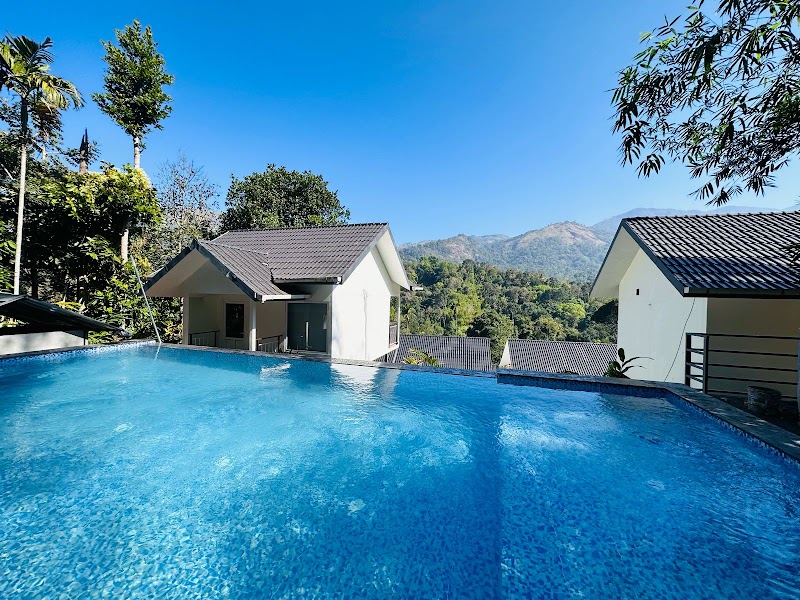 Munnar Majestic Resort - Munnar Majestic Resort Anachal - Kunchithanny Rd, Kunchithanny, Kerala 685565, India