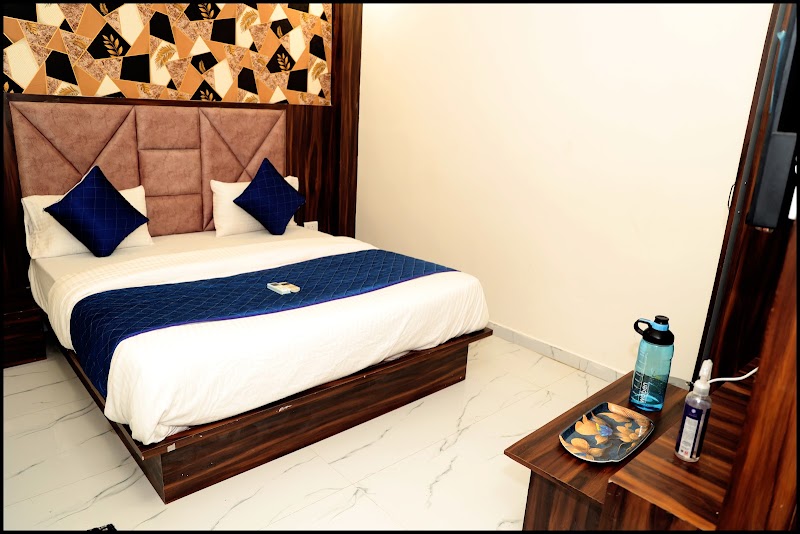 Hotel Nest Pride - Hotel Nest Pride, 2nd Floor, 1, Subhash Bridge Cricle, opp. Nandanvan Complex, Keshav Nagar, Ahmedabad, Gujarat 380027, India