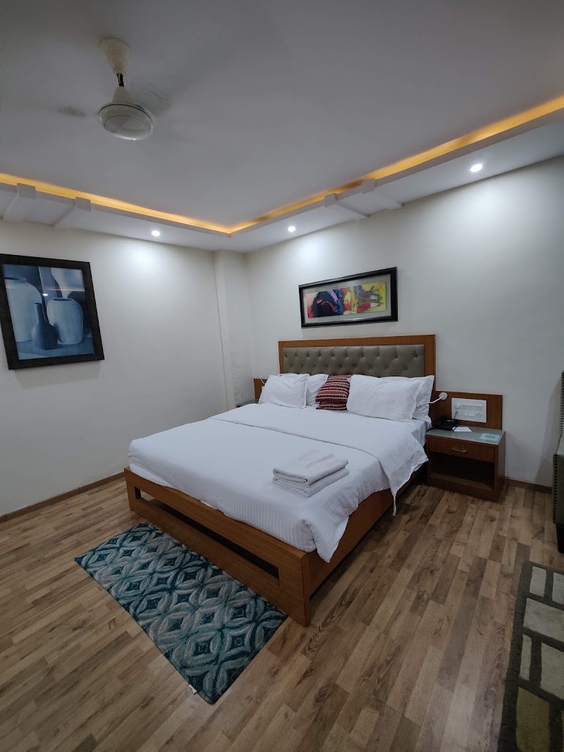 Hotel Hampi International - Hotel Hampi International, Station Rd, Hampi, Hosapete, Karnataka 583201, India