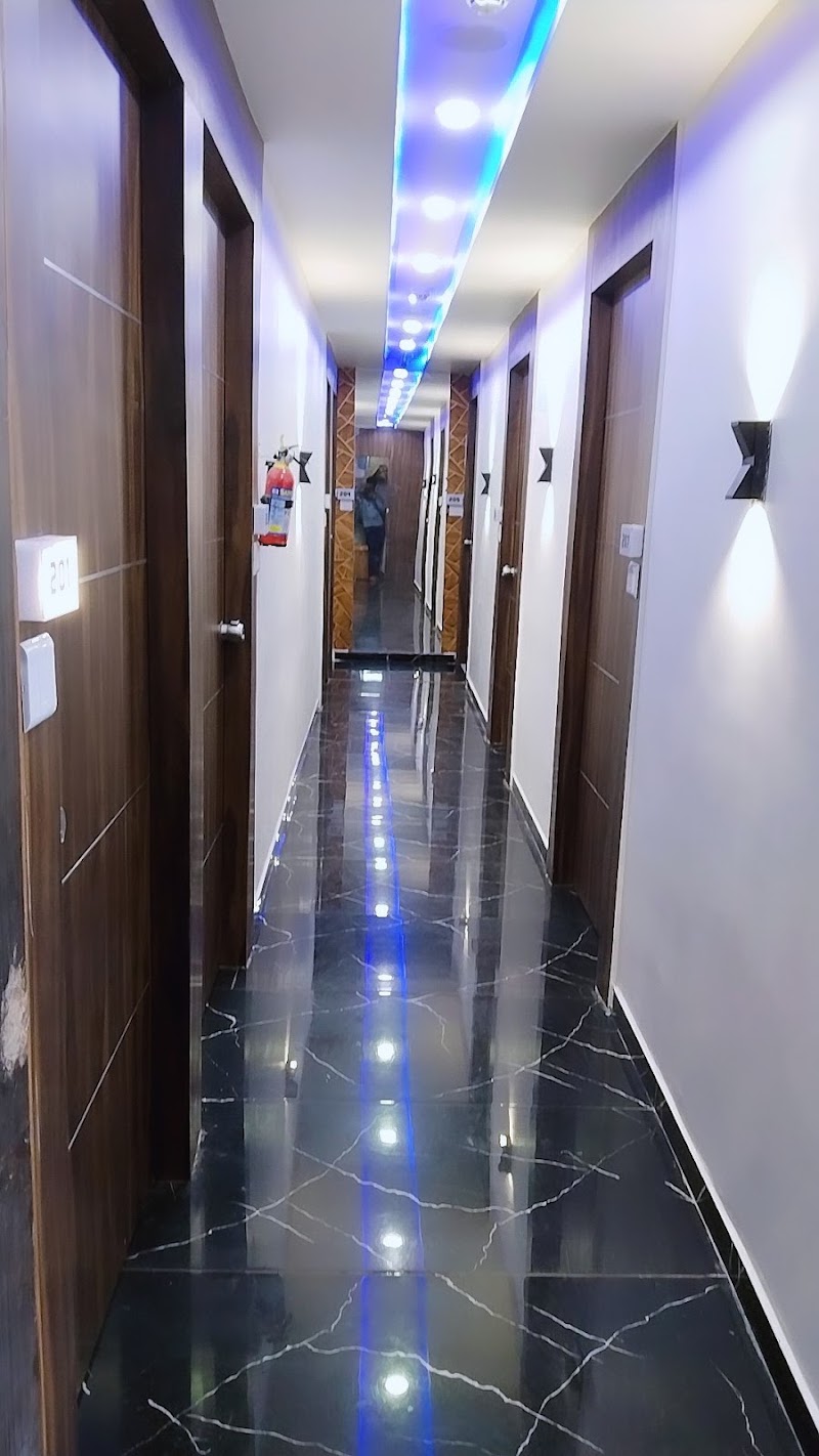 Hotel Nest Pride - Hotel Nest Pride, 2nd Floor, 1, Subhash Bridge Cricle, opp. Nandanvan Complex, Keshav Nagar, Ahmedabad, Gujarat 380027, India