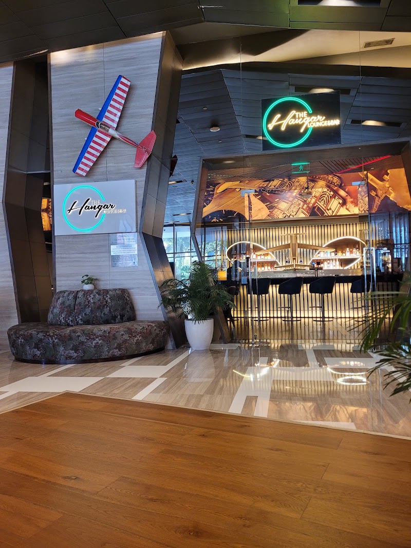 The Hangar Lounge & Bar - Aerocity’s Premier bar & Lounge - The Hangar Lounge & Bar - Aerocity’s Premier bar & Lounge Lobby Level, Holiday Inn New Delhi International Airport, Gate No. 1, Asset Area 12 Hospitality District, Asset Area 12, Hospitality District, Indira Gandhi International Airport, Aerocity, New Delhi, Delhi 110037, India