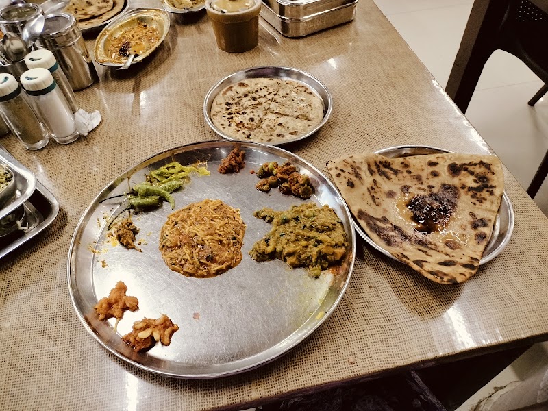 Shree Khodiyar Kathiyawadi Dhaba - Shree Khodiyar Kathiyawadi Dhaba, 5QQH+X5J, Green City Rd, Pal Gam, Surat, Gujarat 394510, India
