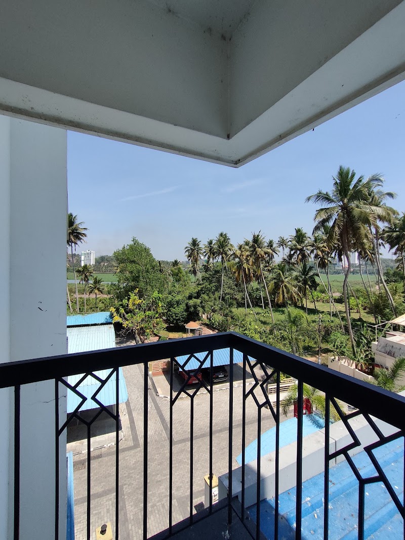 Hotel O Tyche Stays - Hotel O Tyche Stays 1875, Artech Lake Gardens, Near, Akkulam Bridge, behind Pothen's Hyundai, Oruvathilkotta, Thiruvananthapuram, Kerala 695029, India