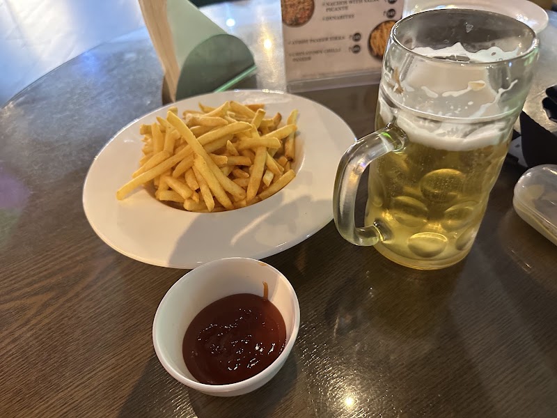 Delhi Capitals Sports Bar - Delhi Capitals Sports Bar Terminal 3, Departure, Ground Floor, Indira Gandhi International Airport, New Delhi, Delhi, 110037, India