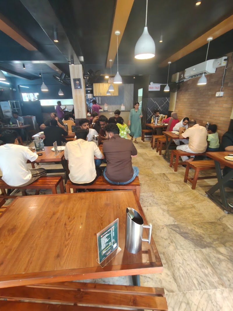 Kuttichira Biriyani Center - Mavoor Rd - Kuttichira Biriyani Center - Mavoor Rd, near Planetarium Nilaoofar Palace, Koombara, Jaffer Khan Colony Rd, near Planetarium, Kozhikode, Kerala 673006, India
