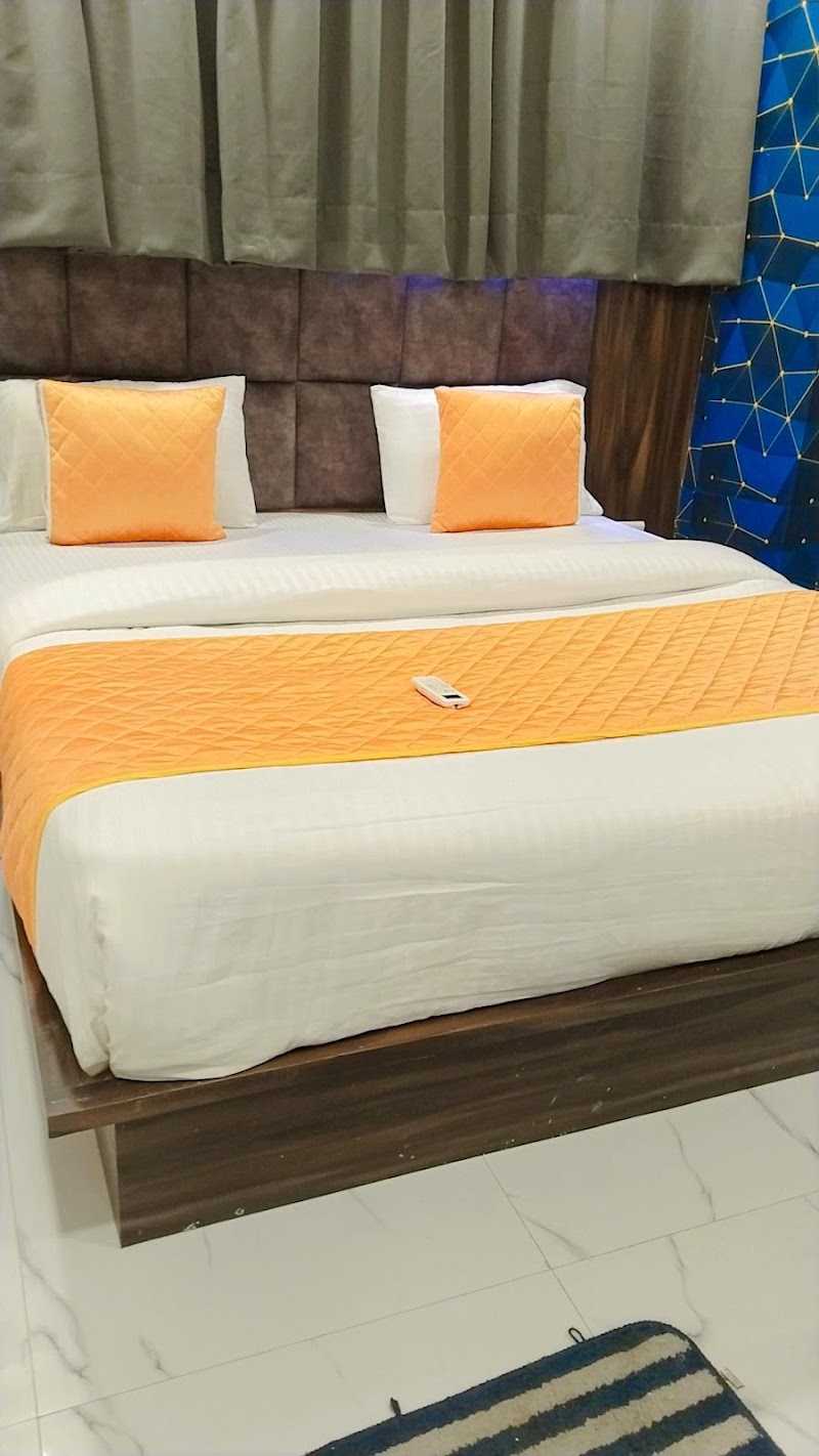 Hotel Nest Pride - Hotel Nest Pride, 2nd Floor, 1, Subhash Bridge Cricle, opp. Nandanvan Complex, Keshav Nagar, Ahmedabad, Gujarat 380027, India