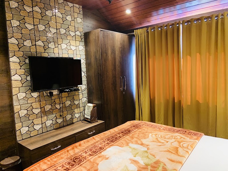 The Log House - The Log House Vimal Kutir, Mall Road, Near Cafe Coffee Day, next to Honeymoon Inn Hotel, The Mall Road, Mussoorie, Uttarakhand 248179, India
