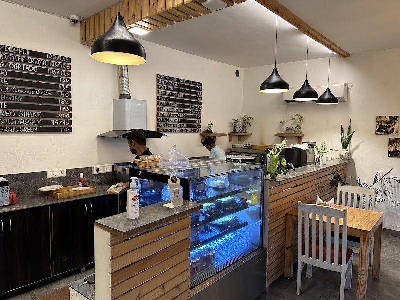 The Green Dot Theory, South Delhi - The Green Dot Theory, South Delhi B-3 Bhatti, Main Rd, Dera Village, Dera Mandi, New Delhi, Delhi 110074, India