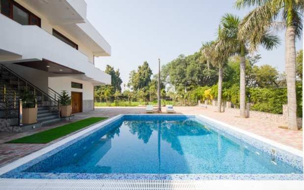 Ivory Estate By Under My Roof | Luxury 5BHK Pool Villa in Faridabad