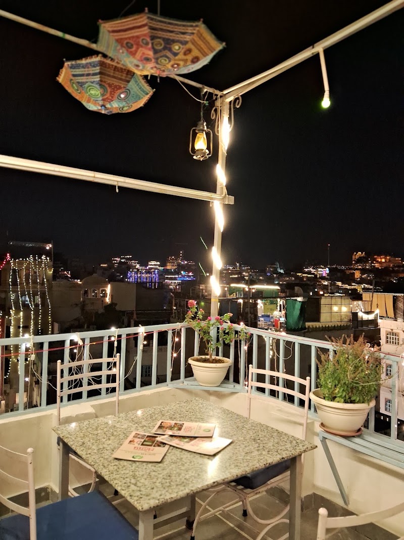 South Grills Rooftop Restaurant - South Grills Rooftop Restaurant 16, Bajarang Marg, Ghat Road, Outside Chandpole, Ambrai, Ambamata, Udaipur, Rajasthan 313004, India