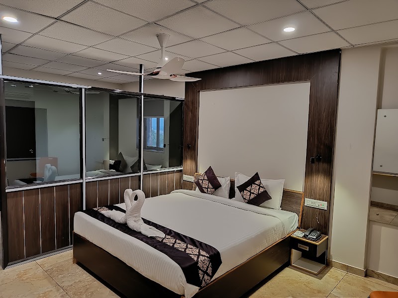 Dev Inn Somnath - Dev Inn Somnath, Patan Road, opp. GIDC Veraval, GIDC, Prabhas Patan, Somnath, Gujarat 362268, India