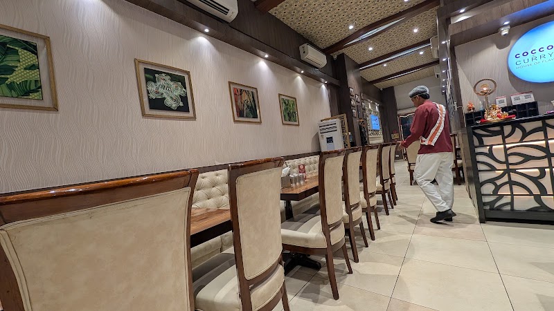 Cocco n Curry - Cocco n Curry 2nd Floor, Good Earth City Center, 225A/B, opposite Malibu Town, Pocket H, Nirvana, Sector 50, Gurugram, Haryana 122018, India
