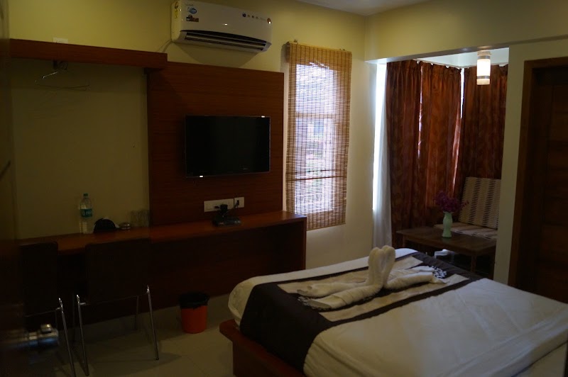 The Grand Inn - The Grand Inn, 2898/1, Keshava Iyengar Rd, behind Suburban Bus Stand, Halladakeri, Mandi Mohalla, Mysuru, Karnataka 570001, India