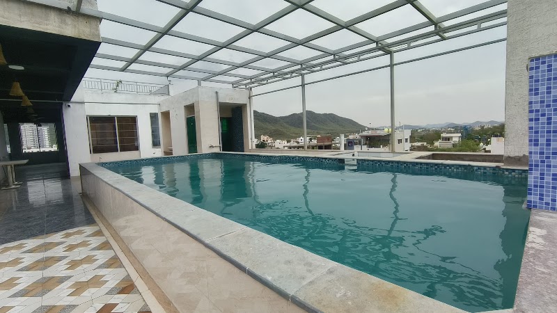 Hotel Hill view By Heritage inn | Swimmingpool - Hotel Hill view By Heritage inn | Swimmingpool 64-A, near K K G House, Sajjan Nagar Maruti Suzuki Service workshop road, rural, Goverdhan Villas, Jeevantara area, Sajjan Nagar, Udaipur, Gordhan Vilas Rural, Rajasthan 313001, India