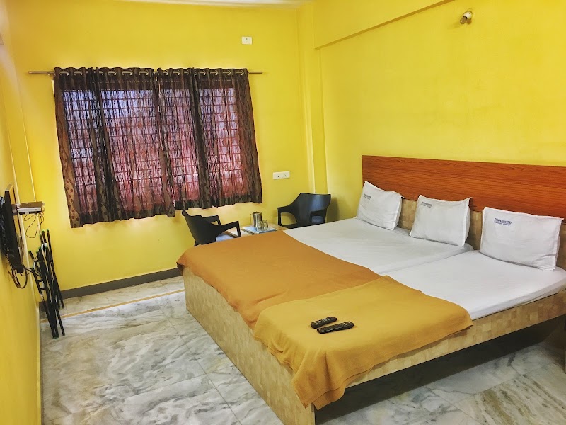 Dhanawantri Comforts Hotel - Dhanawantri Comforts Hotel, Gayatri Bhavan Building, Dhanavantri Rd, near Mysore Railway Station, Devaraja Mohalla, Shivarampet, Mysuru, Karnataka 570001, India