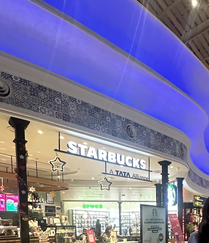 Starbucks - Starbucks, DBF-2, Ground Floor, Domestic, Arrivals # Baggage Re-Claim area, GMR Goa International Airport, Mopa, Kasarvarne, Goa 403512, India