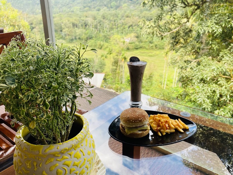 Yellowgate cafe and bistro - Yellowgate cafe and bistro Yellowgate cafe and bistro, Mangalore - Mysore Hwy, near Katekeri, junction, Madikeri, Katakeri, Karnataka 571201, India