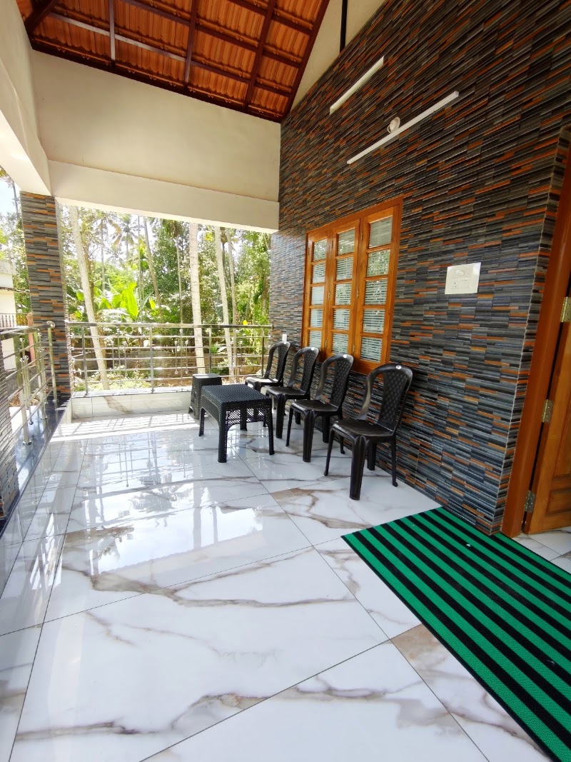Happy Buddha Homestay - Happy Buddha Homestay Thiruvambadi, Saad Cottage Rd, Kurakkanni, Varkala, Kerala 695141, India