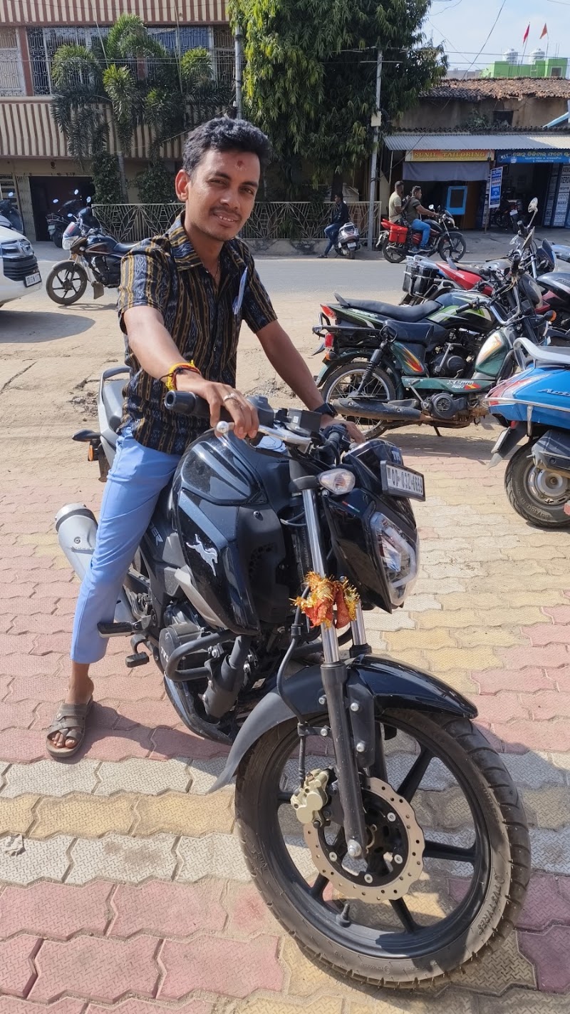 Rajlaxmi Automotive (2 wheeler & EV) - Gandhi Nagar Para - Rajlaxmi Automotive (2 wheeler & EV) - Gandhi Nagar Para, NH 26, Gandhi Nagar Chowk, nearby School Stadium, Gandhi Nagar Para, Balangir, Odisha 767001, India