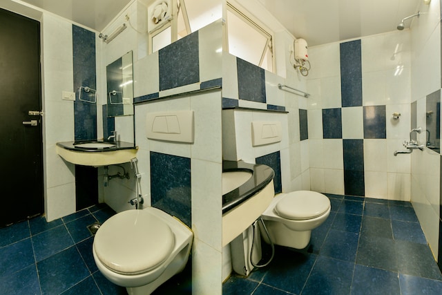 Hotel O Tyche Stays - Hotel O Tyche Stays 1875, Artech Lake Gardens, Near, Akkulam Bridge, behind Pothen's Hyundai, Oruvathilkotta, Thiruvananthapuram, Kerala 695029, India