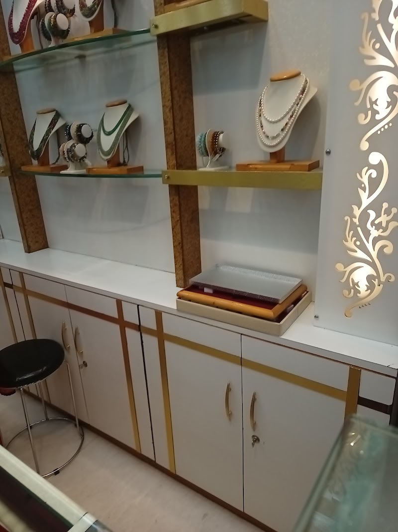 Anmol Jewellers & Ratna kendra - Anmol Jewellers & Ratna kendra, Shyam Talkies Road Infront of Shri Ram Sangeet vidyalaya, Budhapara, Raipur, Chhattisgarh 492001, India