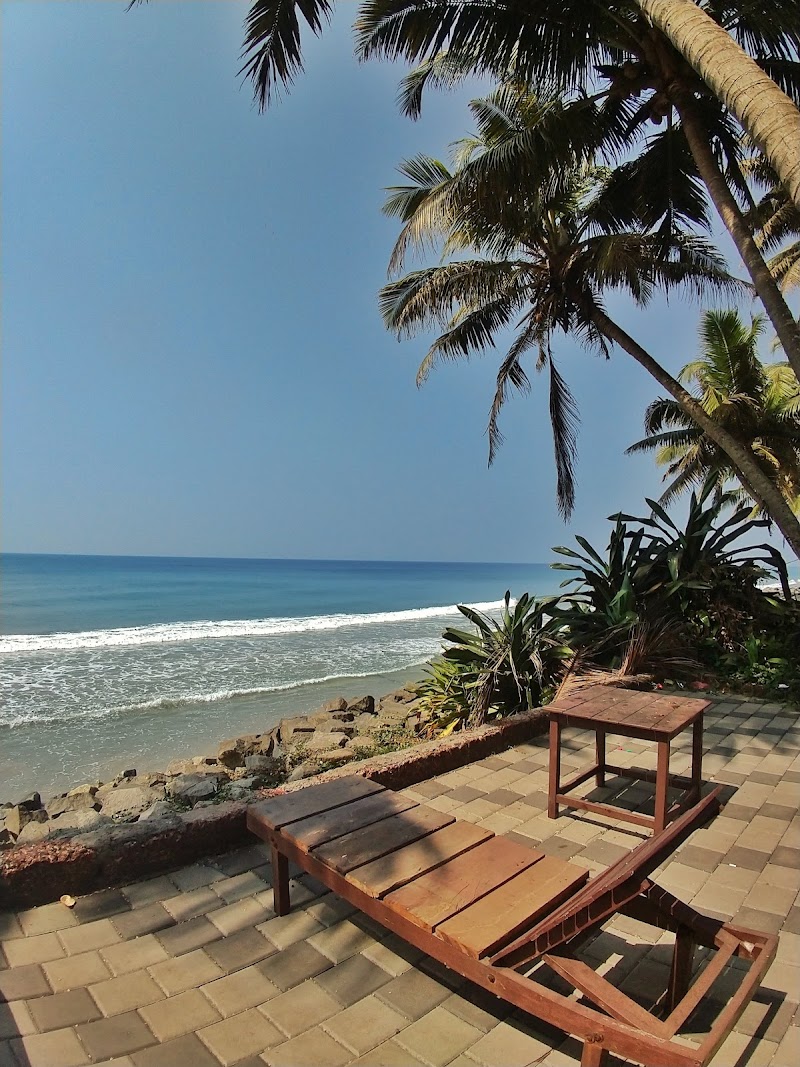 Woodhouse Beach Resort - Woodhouse Beach Resort Thiruvambadi Northcliff, Black Beach, Varkala, Kerala 695141, India