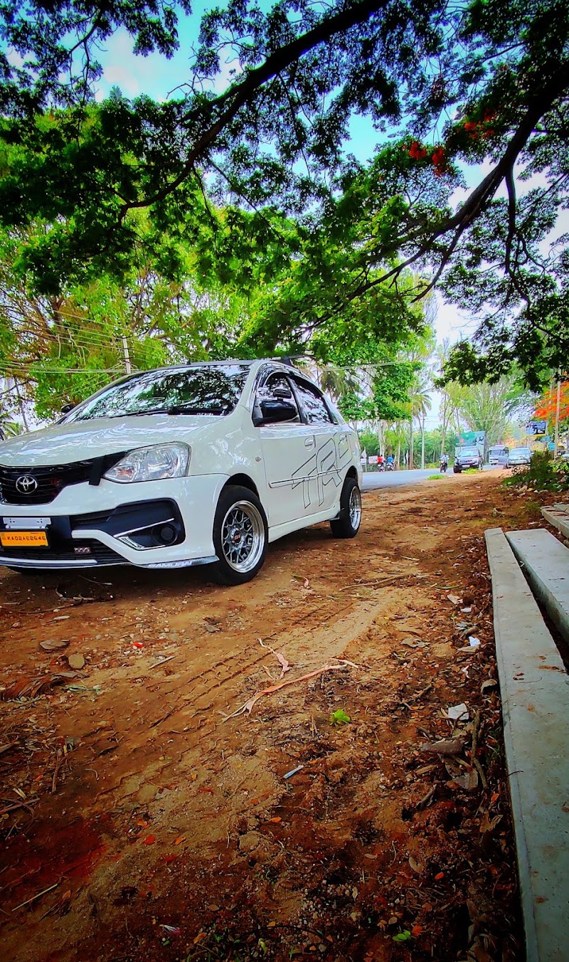 Coorg Taxi Tours and Travels - Coorg Taxi Tours and Travels near raja seat, Mahadevpet, Madikeri, Karnataka 571201, India