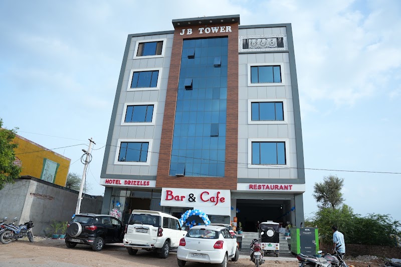 Hotel Drizzles - Hotel Drizzles JB Tower, near DPS Circle Automobile Nagar, Pal Gaon, Jodhpur, Rajasthan 342014, India