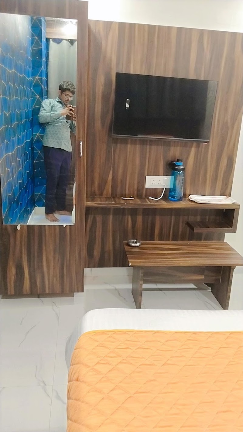 Hotel Nest Pride - Hotel Nest Pride, 2nd Floor, 1, Subhash Bridge Cricle, opp. Nandanvan Complex, Keshav Nagar, Ahmedabad, Gujarat 380027, India