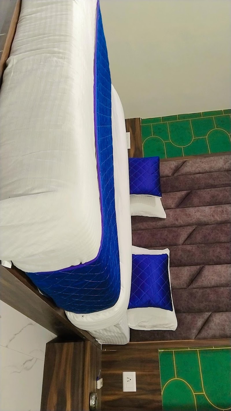 Hotel Nest Pride - Hotel Nest Pride, 2nd Floor, 1, Subhash Bridge Cricle, opp. Nandanvan Complex, Keshav Nagar, Ahmedabad, Gujarat 380027, India