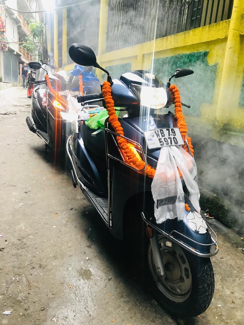 Ghising Bike, scooty And Taxi Rental - Ghising Bike, scooty And Taxi Rental Hill Cart Rd, near Reliance Mart And DRC Car Parking, Limbugaon, Darjeeling, West Bengal 734101, India