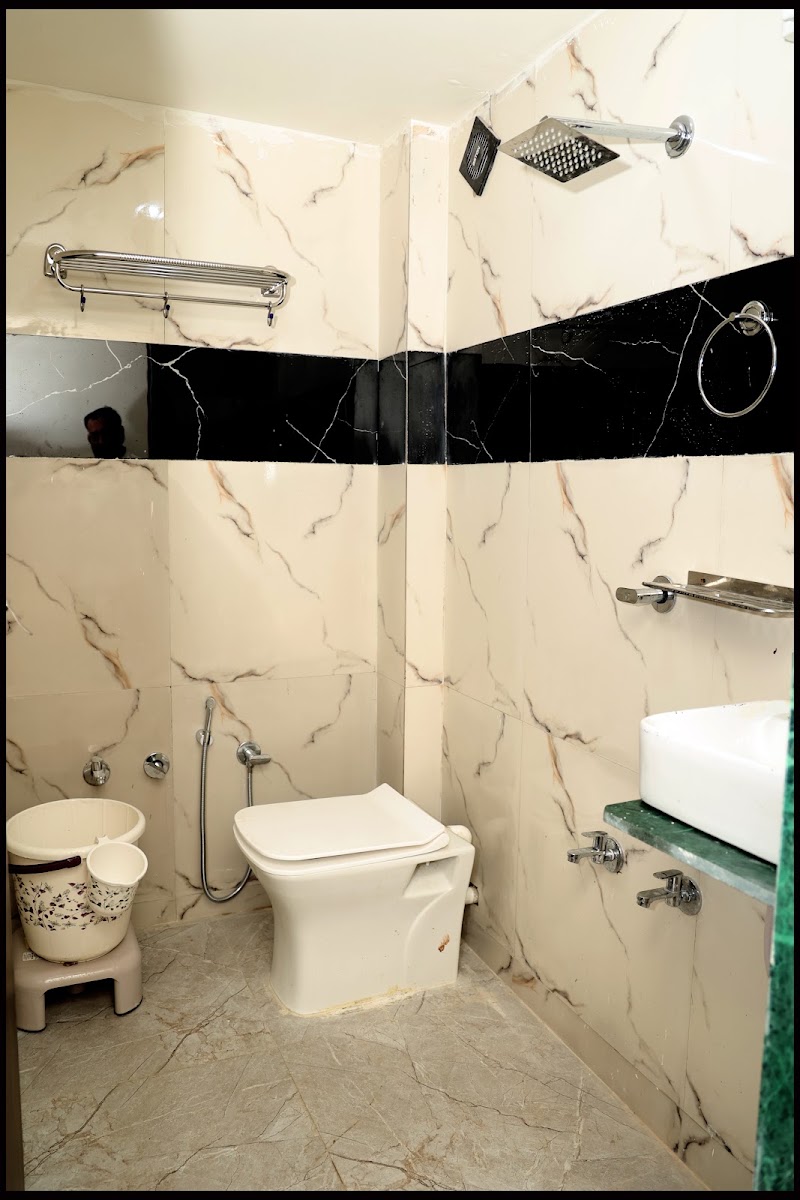 Hotel Nest Pride - Hotel Nest Pride, 2nd Floor, 1, Subhash Bridge Cricle, opp. Nandanvan Complex, Keshav Nagar, Ahmedabad, Gujarat 380027, India