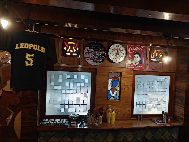 Leopold Cafe - Leopold Cafe Shahid Bhagat Singh Road, Police Station, Colaba Causeway, near Colaba, Apollo Bandar, Colaba, Mumbai, Maharashtra 400001, India