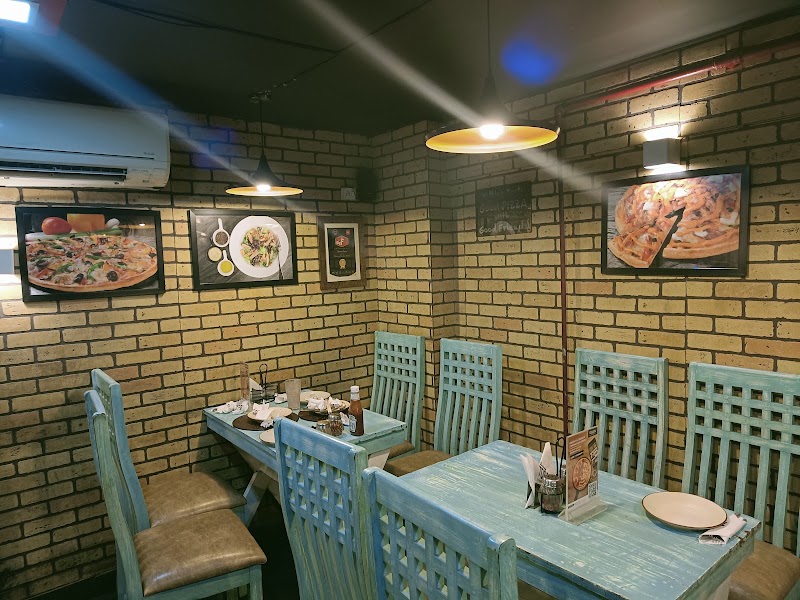 Tossin Pizza Galleria Market - Tossin Pizza Galleria Market First Floor, SF-114, Galleria Market, Sector 28, DLF Phase IV, Gurugram, Haryana 122009, India