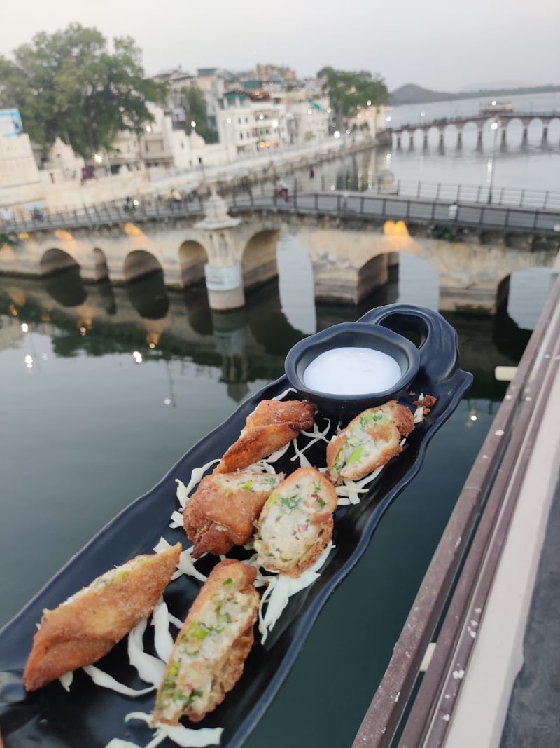 By The Bridge ( BTB ) Cafe And Restro, Rooftop Lake view Udaipur - By The Bridge ( BTB ) Cafe And Restro, Rooftop Lake view Udaipur HMHJ+XQ7, 4, opp. Jethiyo ka Akhada, Outside Chandpole, Pichola, Udaipur, Rajasthan 313004, India