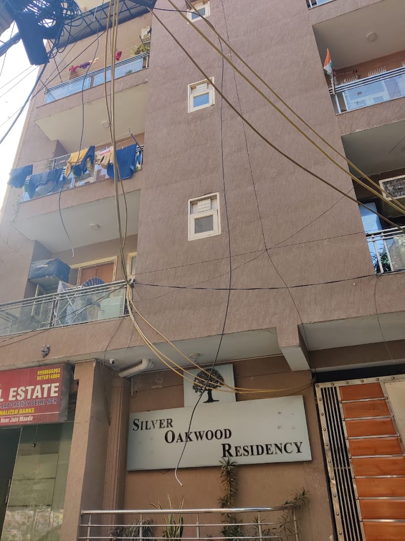 Silver OakWood Residency 1 - Silver OakWood Residency 1, Ward no 8, opp to Qutub minar metro station, near jain dada bari road, Maruti Enclave, Dada bari road, near heritage view residency on, Aam Bagh, Ahinsha Enclave, Mehrauli, New Delhi, Delhi 110030, India