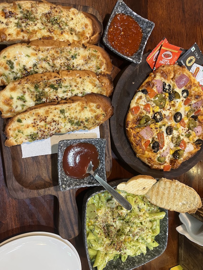 Flavours Cafe & Bakery - Flavours Cafe & Bakery, Swastik Plaza, near ravidas gate, Lanka, Varanasi, Uttar Pradesh 221005, India